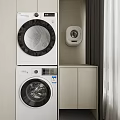 Stacked White Front Load Washing Machines With Wall Mounted Small Appliance And Cabinet