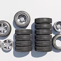 Stacked Car Tires And Wheel Rims Display On White Background