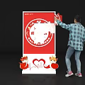 Red Launch Device Featuring Nanyi Action Text with Cartoon Foxes and Heart Shapes