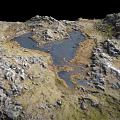 Natural Rocky Terrain With Small Water Pools And Green Grass Patches