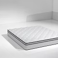 Supportive Quilted Mattress With Diamond Pattern And White Surface In Bright Room