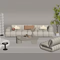 Modern White Upholstered Sofa And Coffee Table Combination With Pillows Potted Plant And Accent Chairs