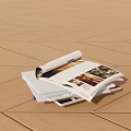 Open Books and Magazines with Colorful Images on Wooden Floor