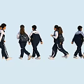 Group of Students Wearing School Uniforms With Backpacks Walking Together