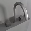 Modern Stainless Steel Faucet With Two Handles On Contemporary Sink Counter