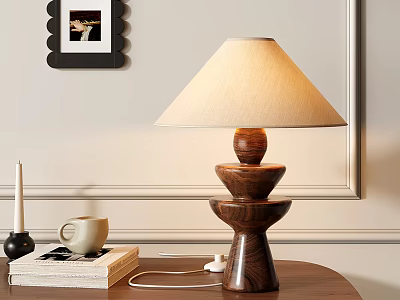 Wooden Base Table Lamp With Beige Fabric Shade On Table With Books Mug And Candle 3d model