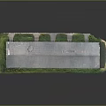 Long Industrial Building With Metal Roof Surrounded By Green Grass