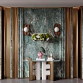 Luxurious Foyer Entryway With Green Marble Wall Gold Accents Wall Sconces And Console Table