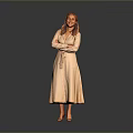 Woman In Light Pink Dress Standing With Arms Crossed Against Gray Background