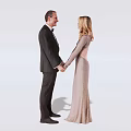 Stylish Couple Holding Hands In Formal Tuxedo And Evening Gown