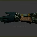 Detailed Ornate Green Glove With Golden Bracer And Intricate Decorative Patterns