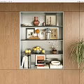 Built in Storage Cabinet in Wooden Wall with Shelves Books Lemons and Decorative Items