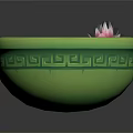 Pink Lotus Flower And Green Lily Pads In Green Patterned Bowl On Water Surface