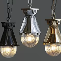 Three Modern Pendant Lights Featuring Metal Frames And Transparent Glass Shades