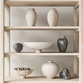 Minimalist Ceramic Vessels Including Vases And Bowl On Wooden Shelves With Neutral Tones
