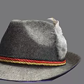 Gray Woolen Hat With Red Yellow Black Braided Band And Feather Accent