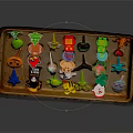 Colorful Small Handmade Figurines in Rustic Tray with Assorted Shapes and Designs