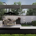 Stylish Outdoor Garden Decor in Walled Space with Umbrella Dining Set Wall Lights and Greenery