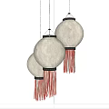 Three White Decorative Lanterns Hanging with Red Tassels on Black Background 3d model