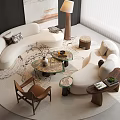Modern Living Room With White Curved Sofa And Round Glass Coffee Table Set