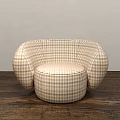 Comfortable Plaid Pattern Bean Bag Chair With Rounded Design On Wooden Floor