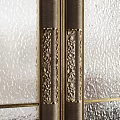 Modern Double Doors Design Featuring Glass Panels Dark Wooden Frames And Metal Strips