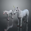 White Unicorn Figures Featuring Adult And Baby Size On Gray Background With Reflection