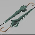 Stylish Folded Green Umbrellas With Golden Handles And Textured Canopies For Daily Use