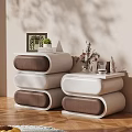Modern White And Brown Dresser With Curved Drawers Decorative Vase Photo Frame And Green Plant
