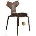 Modern Walnut Wood Dining Chair With Curved Backrest Sleek Legs And Wooden Ball Accent