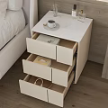 Modern Bedside Table With White Top Drawers Coffee Cup Glass And Perfume Bottles