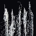 Garden Water Feature With Vertical Water Jets And Splashing Streams
