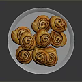 Freshly Baked Delicious Golden Swirled Cinnamon Rolls On A Plate