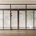 Modern Glass Doors With CCC Lettering And Office Interior With Wooden Flooring