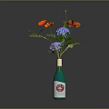 Decorative Green Wine Bottle With Red Poppies And Blue Hydrangeas Arrangement