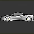 Silver Sports Car With Sleek Modern Design And Large Alloy Wheels On Reflective Surface