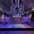 Modern Bar Interior With Stage Leather Sofas Colorful Lighting And Sound System