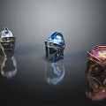 Three Elegant Rings Featuring Different Designs Silver Diamond Blue Decor And Gold Purple Gemstone