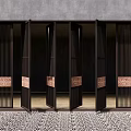 Modern Black Metal Folding Doors With Vertical Slats And Copper Accents For Entrance Space Design