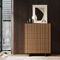 Elegant Modern Entryway Console Cabinet With Woven Texture Decorative Items And Natural Light Through Window