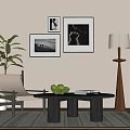 Elegant Leisure Chair in Beige Living Room with Black White Art Green Plant and Coffee Table