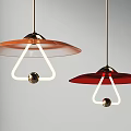 Two Modern Pendant Lights With Red Orange Shades And Triangular Design Accents 3d model