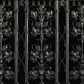 Ornate Metal Staircase Railing With Intricate Floral Patterns And Colorful Design Elements