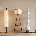 Modern Floor Lamps With Diverse Shapes Wooden Bases And Fabric Shades For Home Decor