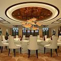 Luxurious Private Dining Room Interior With Round Table White Chairs Chandelier TV And Wall Art
