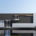Modern Background Wall Design With Waterfall Features Gray White Panels And Wooden Accent