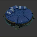 Traditional Circular Furniture With Blue Cushions And White Patterned Pillows On Dark Wooden Base