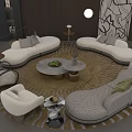 Modern Curved Sofa And Round Coffee Table Set With Area Rug And Decorative Accents