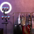 Projection Monitoring System For Live Clothing Streaming With Female Host And Ring Light