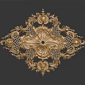 Golden Ornate Decorative Household Item Featuring Intricate Patterns And Central Gemstone Accent